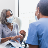 woman having a consultation with a health professional